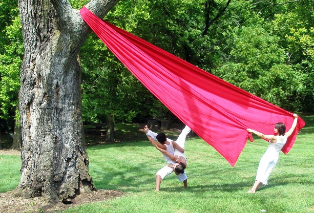Dancers rehearse on the sloping riverfront grounds of Dublin Arts Council.