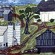 “Family Barns” (detail), rug designed and hooked by Altha Brooks.