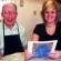 From the left, Clair Weeder, Vancrest resident artist, and Mnemetherapist Lydia McKinley enjoy the final results of an art session.